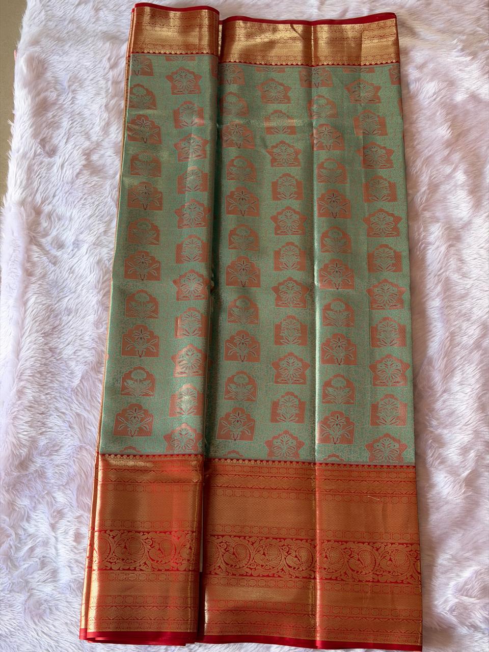Kanchipuram Silk Saree with Vibhuti Green & Kumkum Red