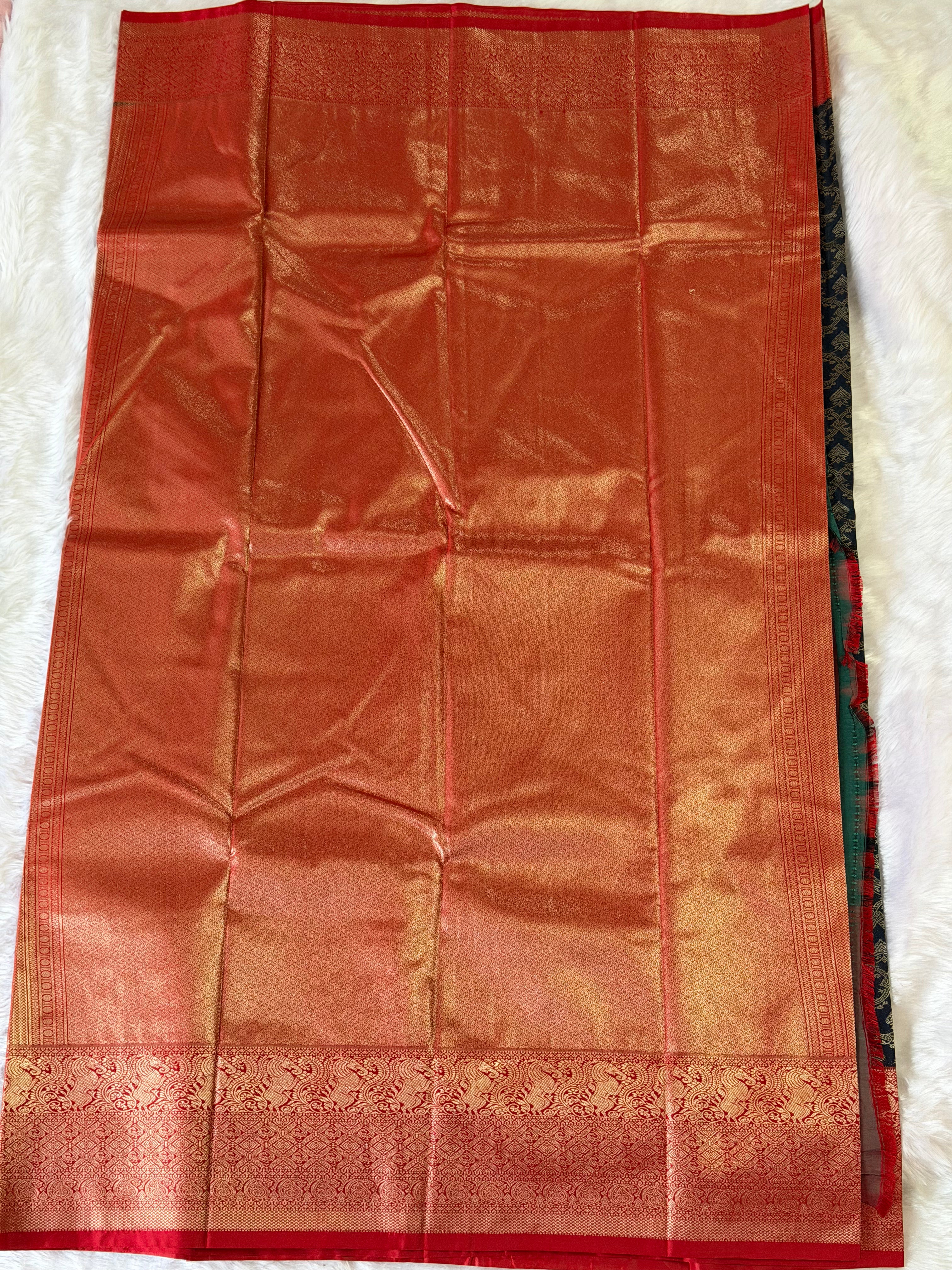 Black Kanchipuram polyester saree body with all-over dense gold zari butta work