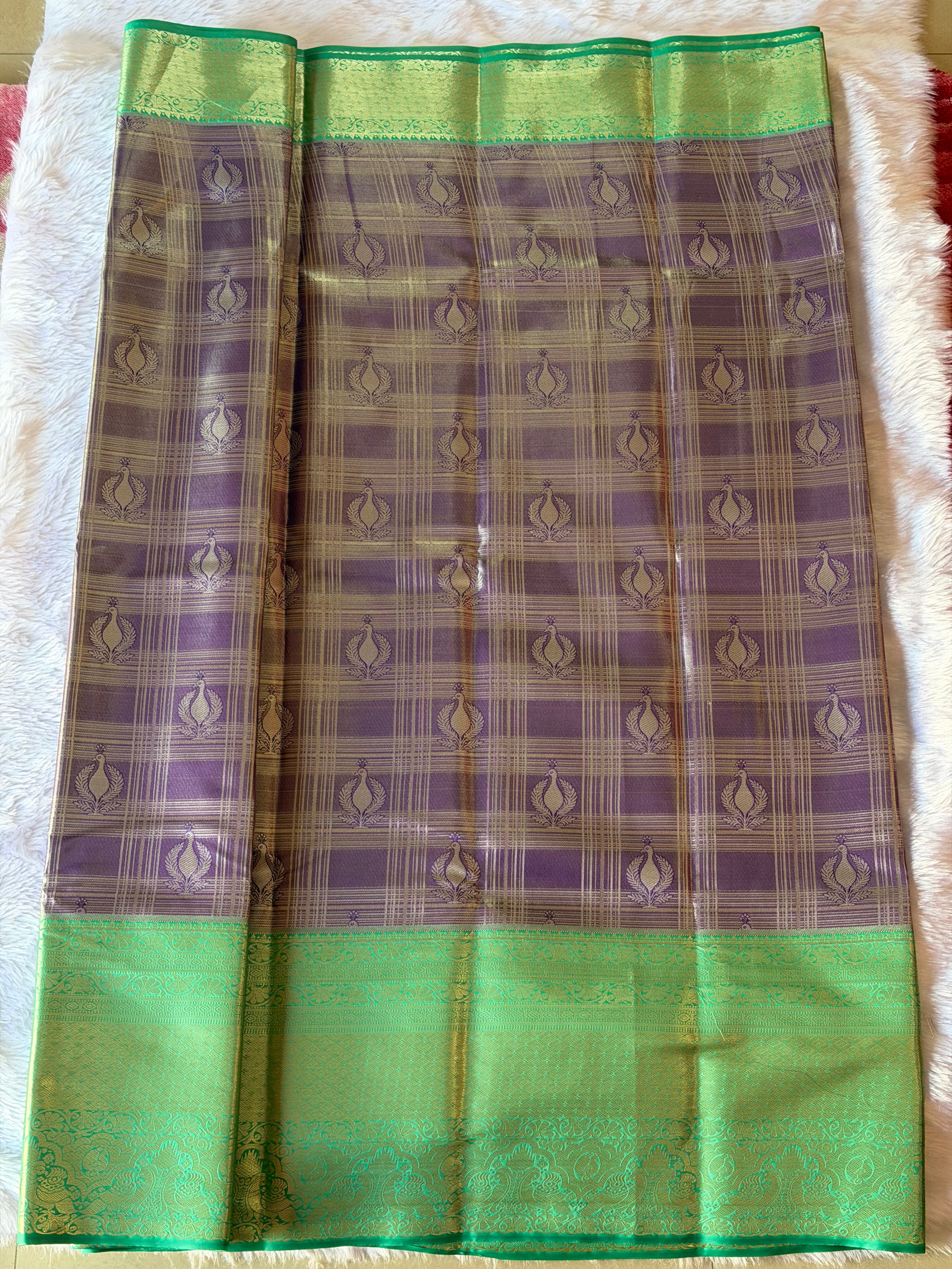 Royal purple contrast border and pallu on emerald green Kanchipuram polyester saree