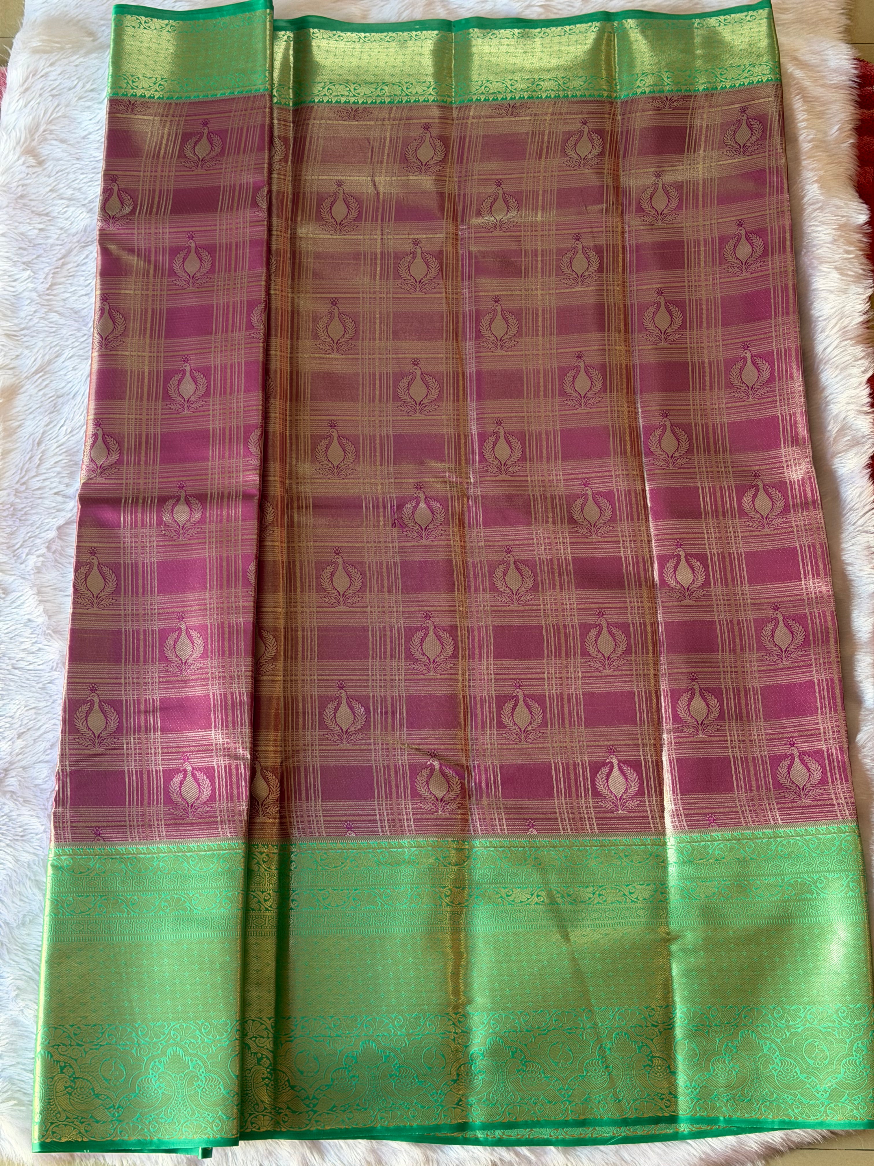 Deep grape purple pallu and border on emerald green Kanchipuram polyester saree