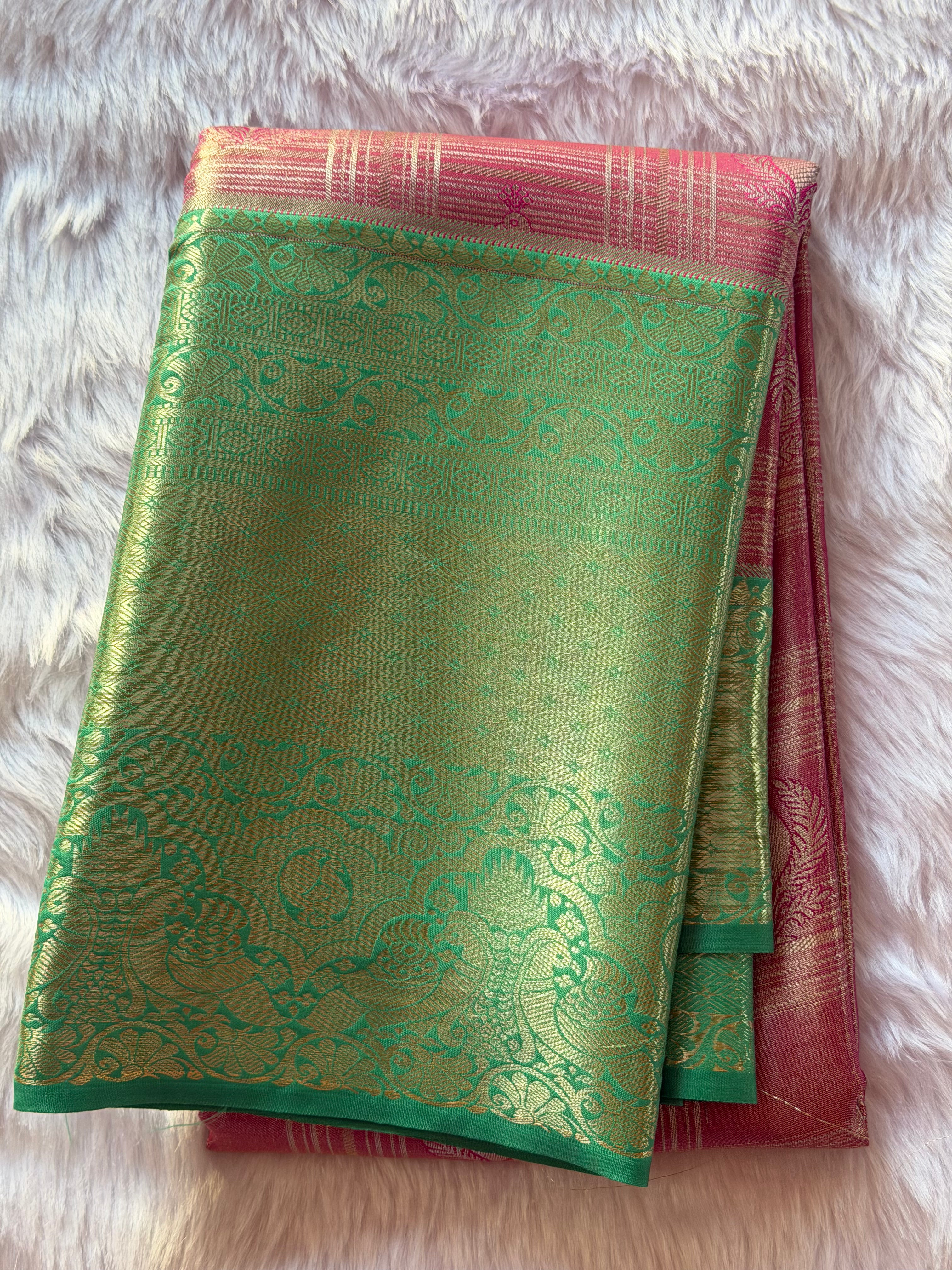 Emerald green Kanchipuram polyester silk saree with vibrant purple and magenta contrast border - NN Silk Sarees